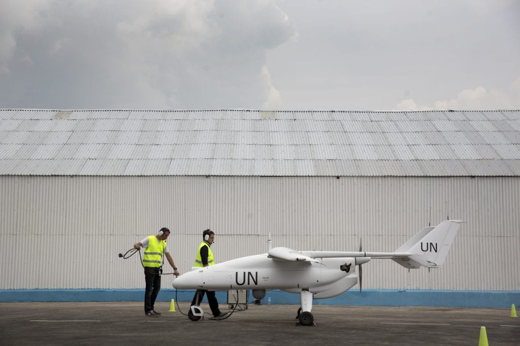 MONUSCO Photos A team of technicians prepares for the inaugural flight of an Unmanned/Unarmed Aerial Vehicles (UAV) in Goma, North Kivu province, during an official ceremony organized in the presence of USG for Peacekeeping Operations, Herve Ladsous, on 3 December 2013.