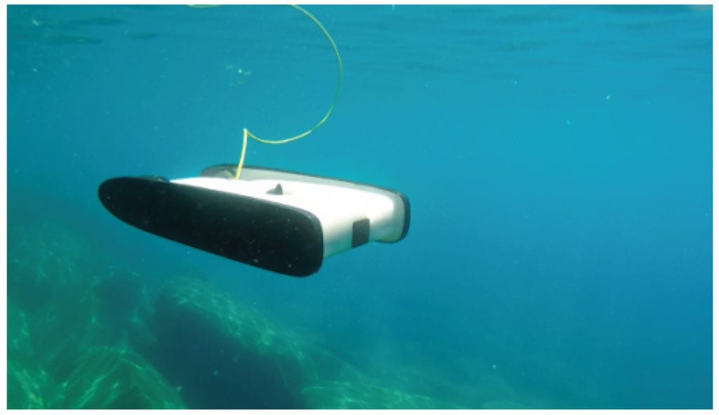 A small underwater OpenROV robot connected through a thin cable for video and control transmissions 
