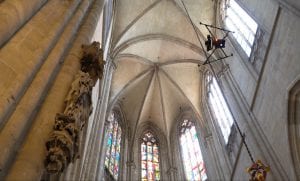 The Intel Falcon 8+ commercial inspection drone inspects a historic sculpture of St. Sixtus inside the Halberstad Cathedral in Saxony-Anhalt, Germany. (Credit: Intel Corporation