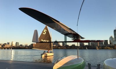 An albatross glider, designed by MIT engineers, skims the Charles River. Credit Photo: Gabriel Bousquet