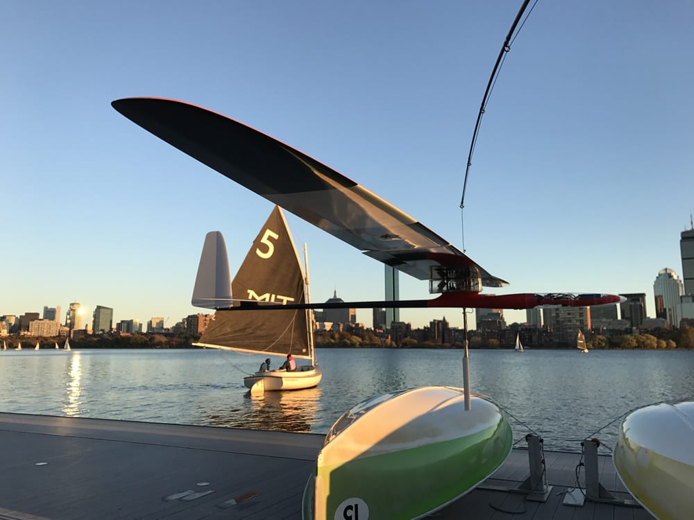 An albatross glider, designed by MIT engineers, skims the Charles River. Credit Photo: Gabriel Bousquet