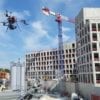 A drone monitors a construction site