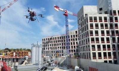 A drone monitors a construction site