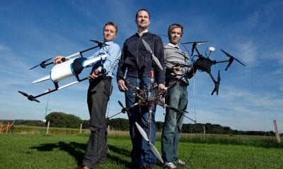 Theys, left, with some self-made drones created with colleagues at the University of Leuven | DIY Drones