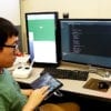 Hao Kang, doctoral student and co-investigator for FlyCam, works on the touch-screen navigation system. (Purdue University photo/High Performance Computer Graphics Lab)
