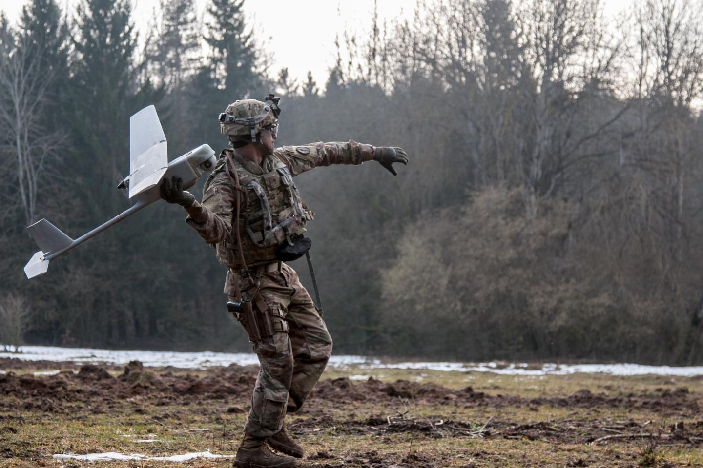 Army Spc. William Ritter prepares to launch the RQ-11 Raven, a small unmanned aerial system into the air during a 2018 training event. Credit. U.S. Army photo by Spc. Dustin D. Biven / 22nd Mobile Public Affairs Detachment